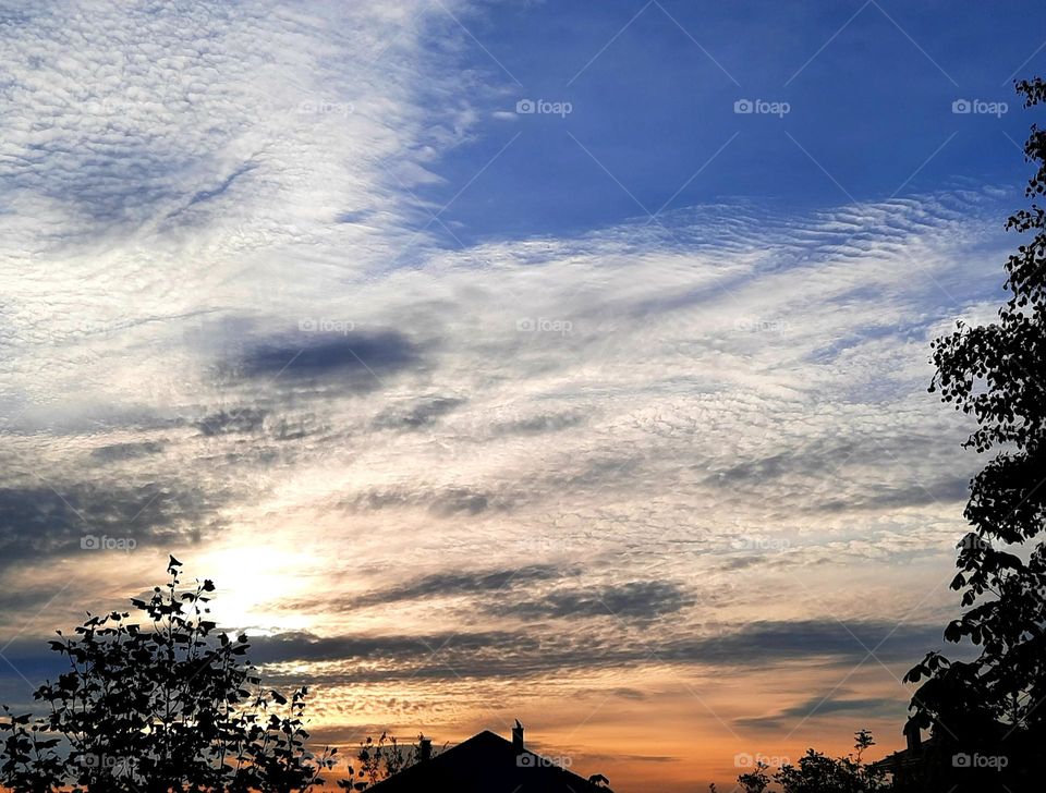 landscape with clouds at sunrise