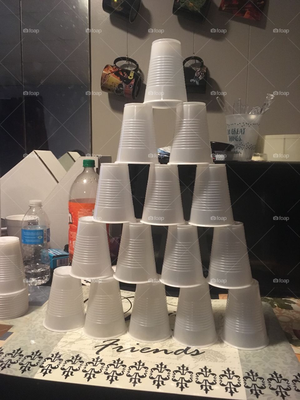 A stack of white plastic cups 