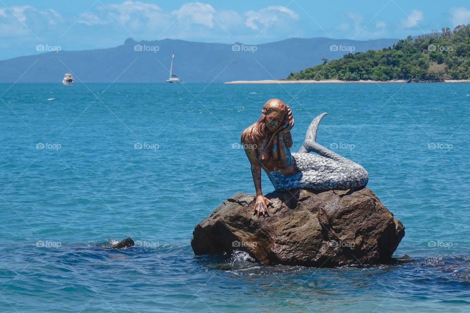 Mermaid with shell phone