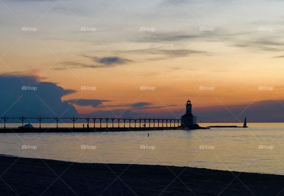 Lighthouse At Sunset