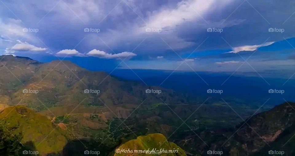 Glory be to God, the magnificent and picturesque view and the natural green trees are a view that is nothing more wonderful than it