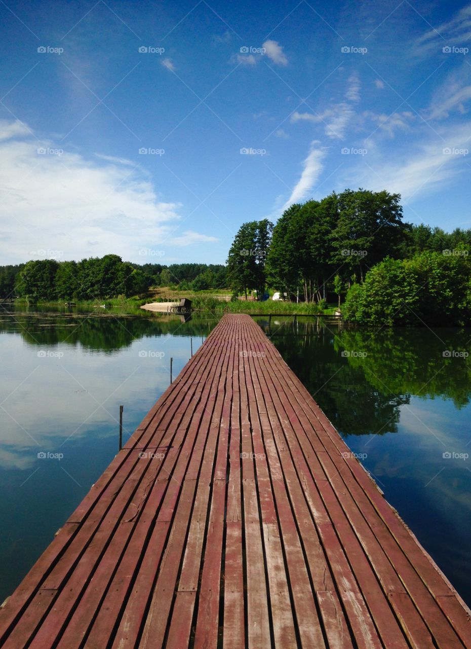 Wooden pier on the lake in mazury region Poland 