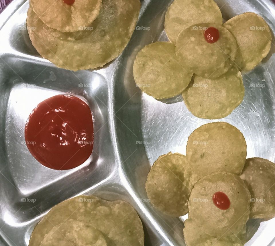 Masala Puri is tasty and delicious dish. Tasty, yummy, spicy Puri and yummy tomato sauce.