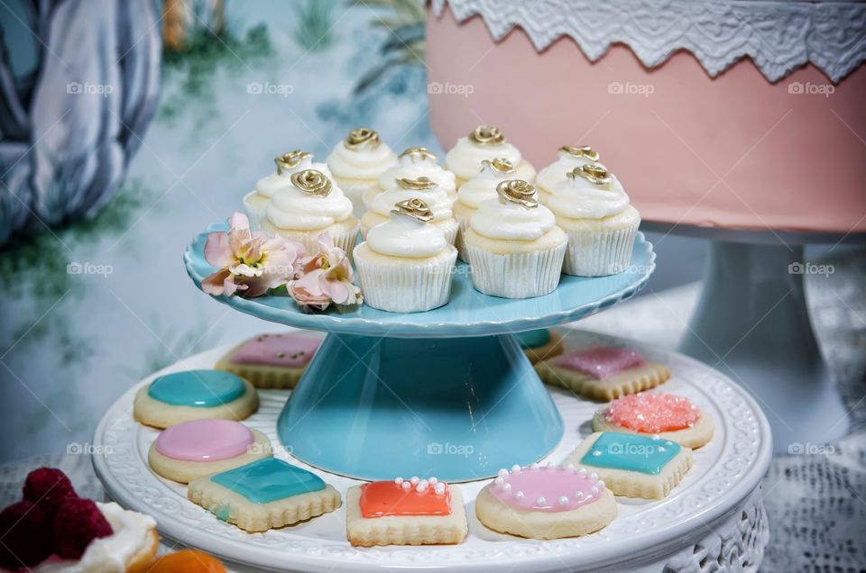 Beautifully decorated mini cupcakes and shortbread cookies