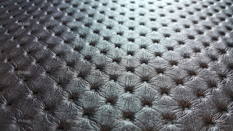 close up of black leather texture pattern