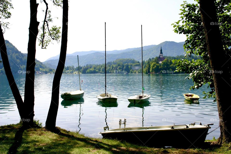 Three boats anchored on Bled lake 