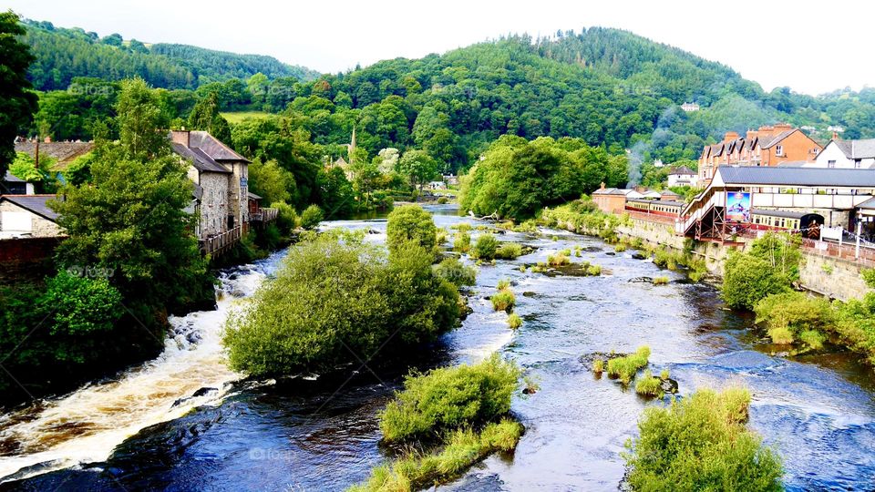 A river crossing a village at wales uk