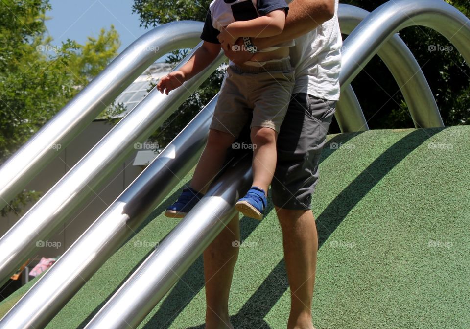 Dad and son on Slide