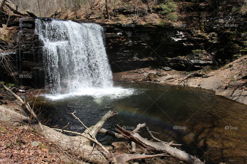 Cascade waterfall and rainbow