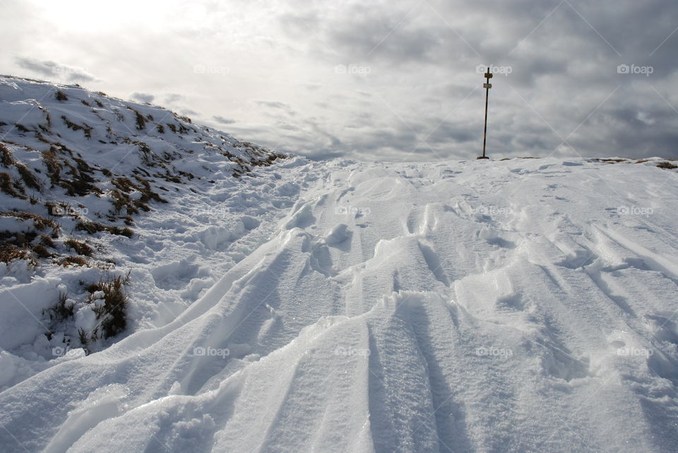 When the wind combs the snowy mountain slope