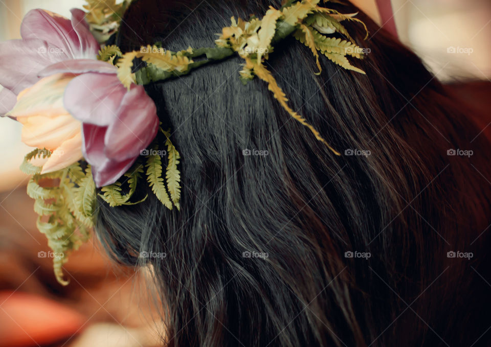 Wearing a flower crown garland in long hair with beautiful tulips and ferns fairy design style 
