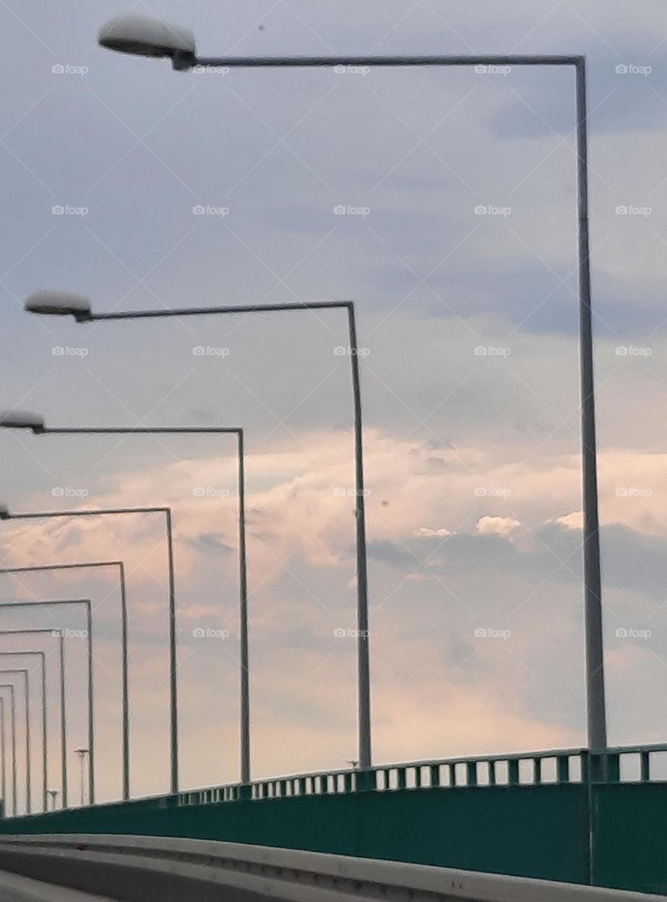 road trip on the viaduct at sunset