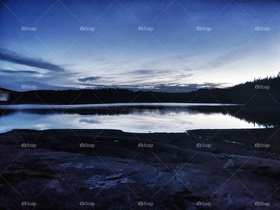 Beautiful mountain lake in norway, moonlight reflection