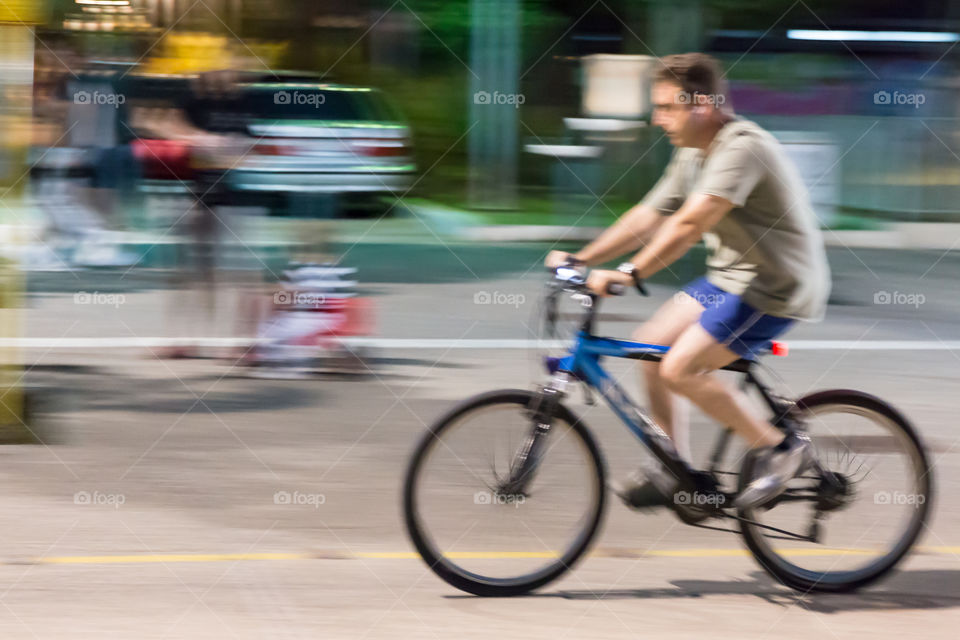 Young Man On Bike Ride In The City
