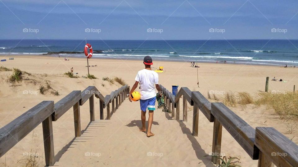 Walking towards a wonderful summer day at the beach