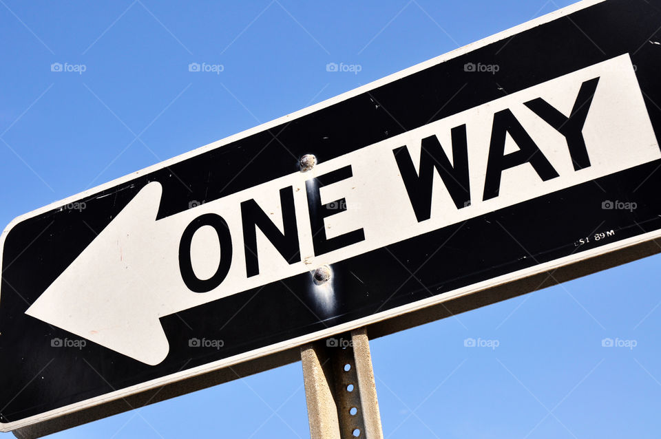 One way sign. 