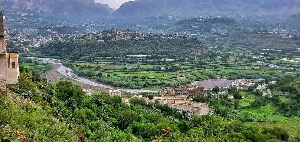 Glory be to God, the magnificent and picturesque view and the natural green trees are a view that is nothing more wonderful than it