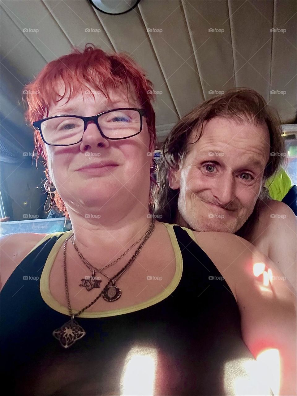 The happy couple is myself, “Petra Schiller” a.k.a. “Maxine Firefox” and partner “Timothy Trespas” aboard “Salvation”, the “28 foot 1969 Luhrs” cabin cruiser at “Newtown Creek” by the “Pulaski Bridge” in LIC, Queens. 2024. Hypnotic Productions