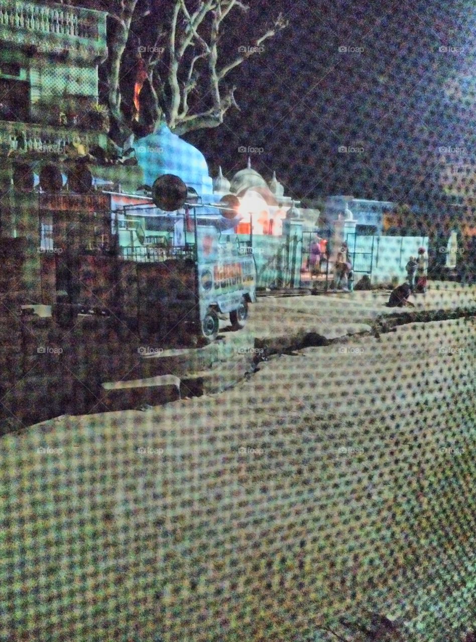 Illuminated mosque at night