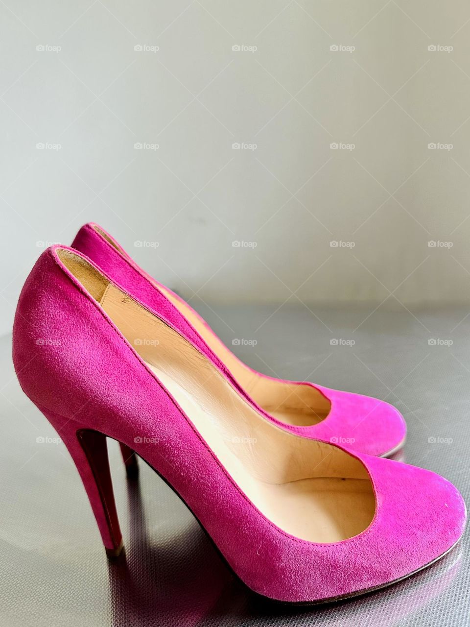 Stepping out in fashionable pink high heel pumps Barbie style. 