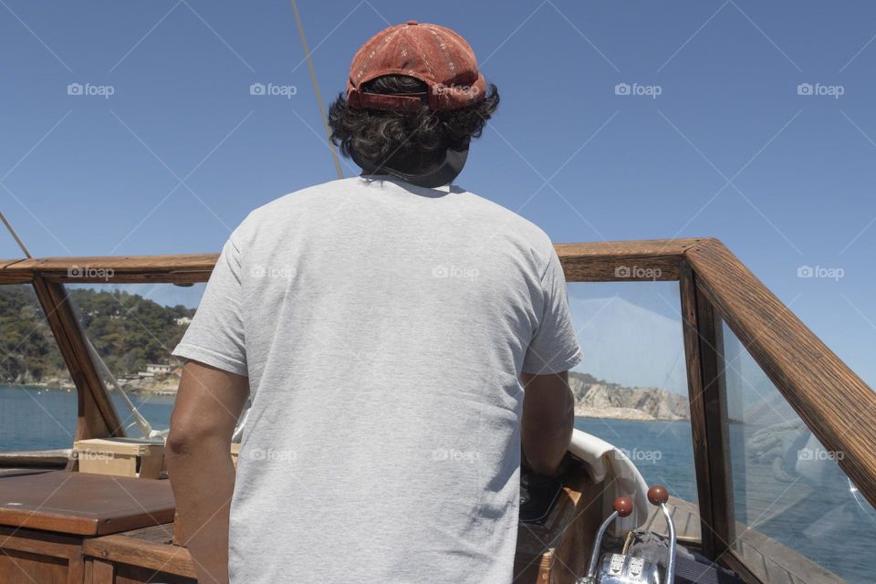 Back view of man on the boat