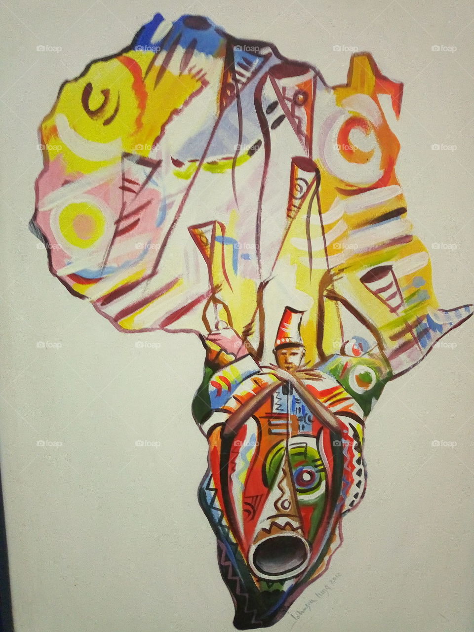 Snap this at American University of Nigeria, hotel at Yola South of Adamawa
state(Land of beauty). this is an art work of the map of Adamawa, showing a man blowing trumpet, with a royal regalia. we call him Dan fada in Hausa, meaning palace guards.