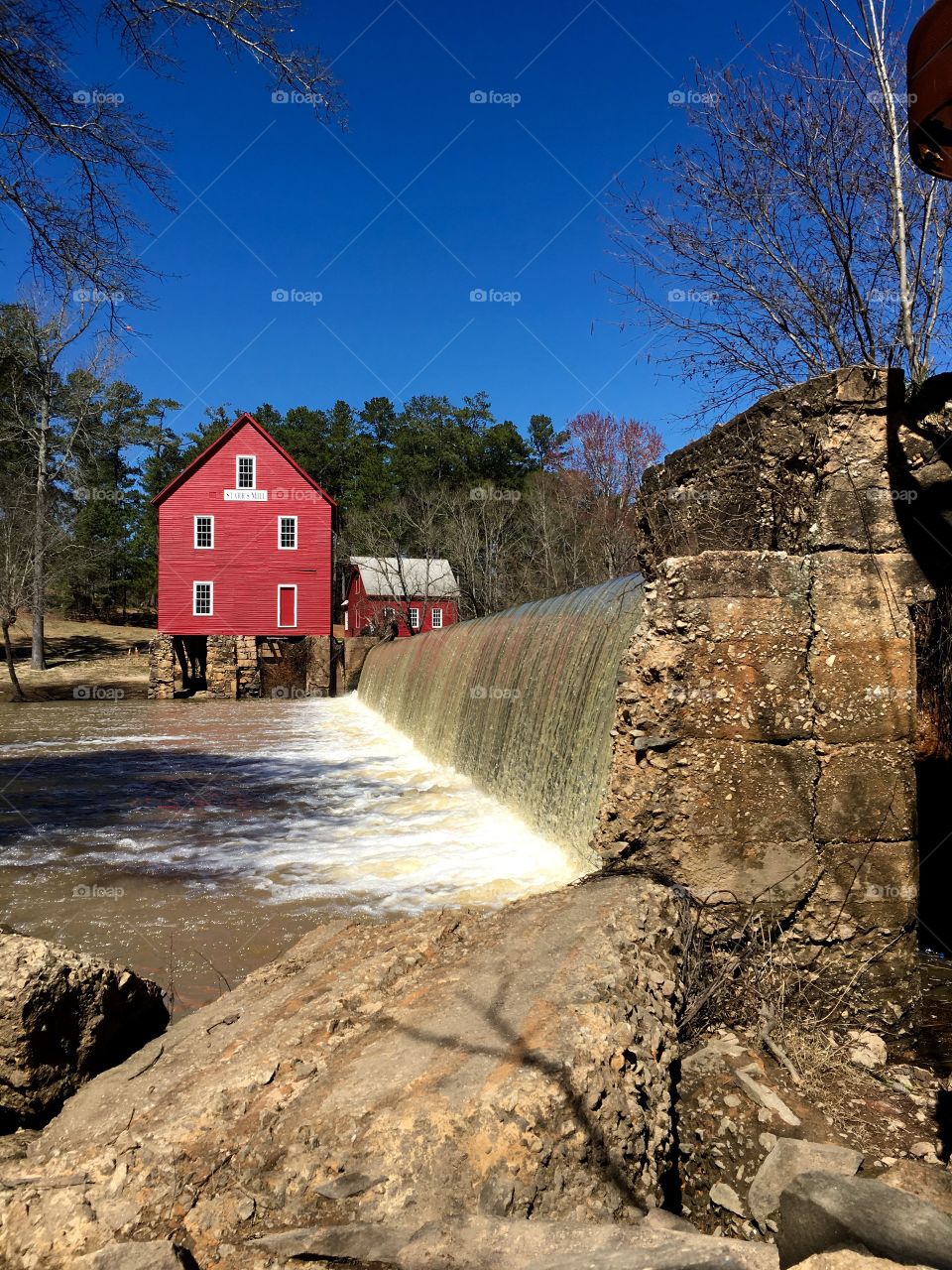 Red mill and waterfall