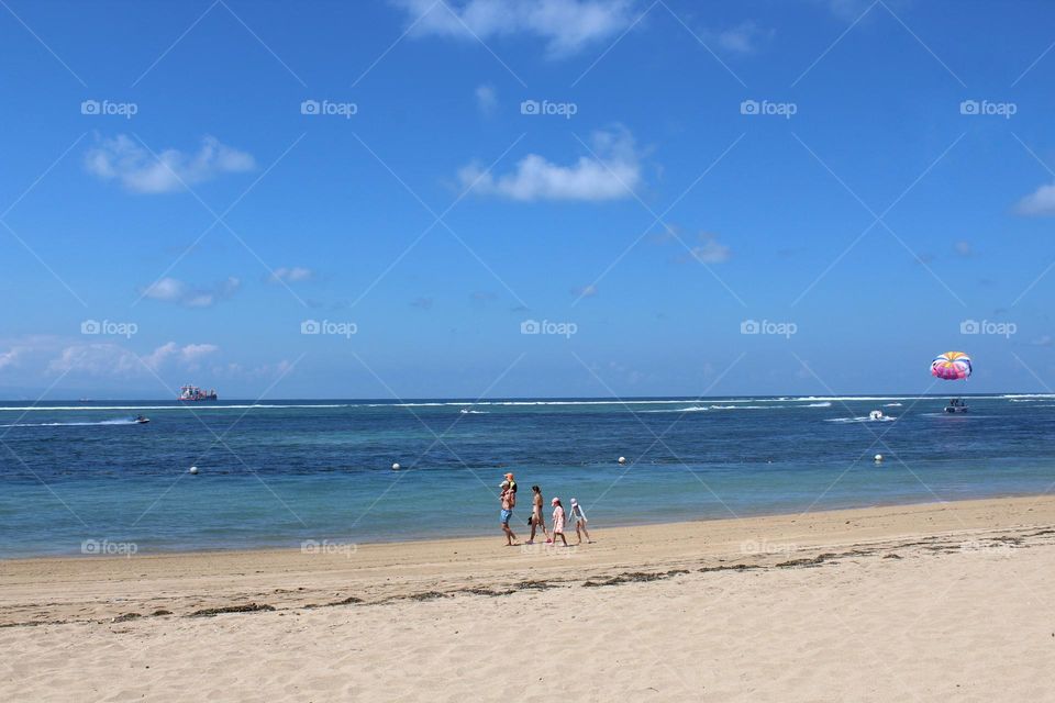 Fun family vacation time in Nusa Dua resort area of Bali island