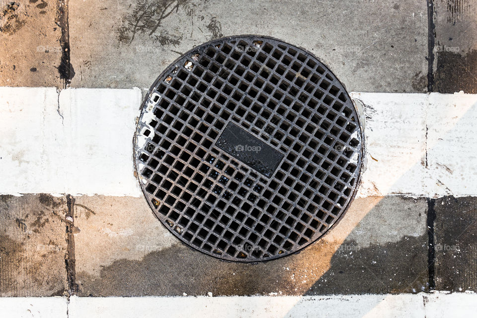 Round sewer on the road