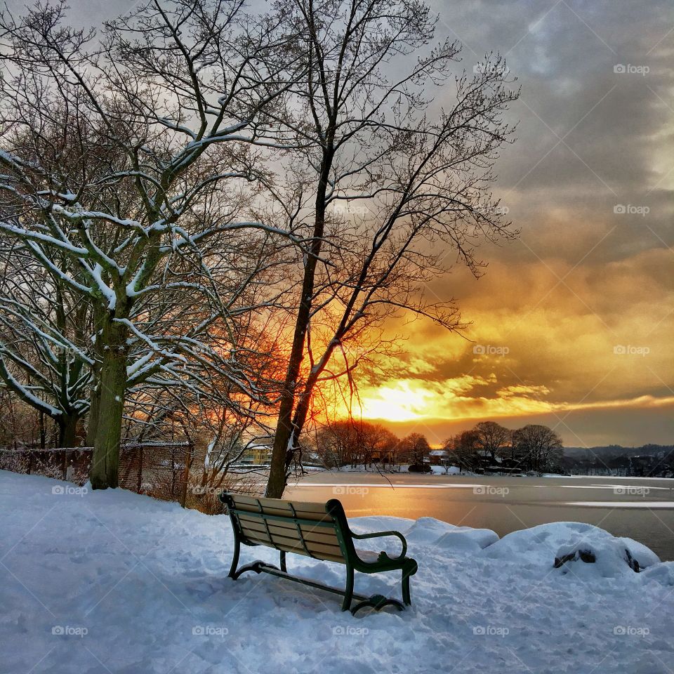 Watching a golden Sunset at Spy Pond 