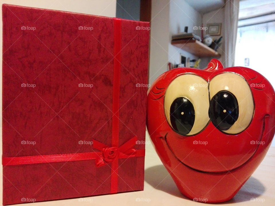 red gift and smile