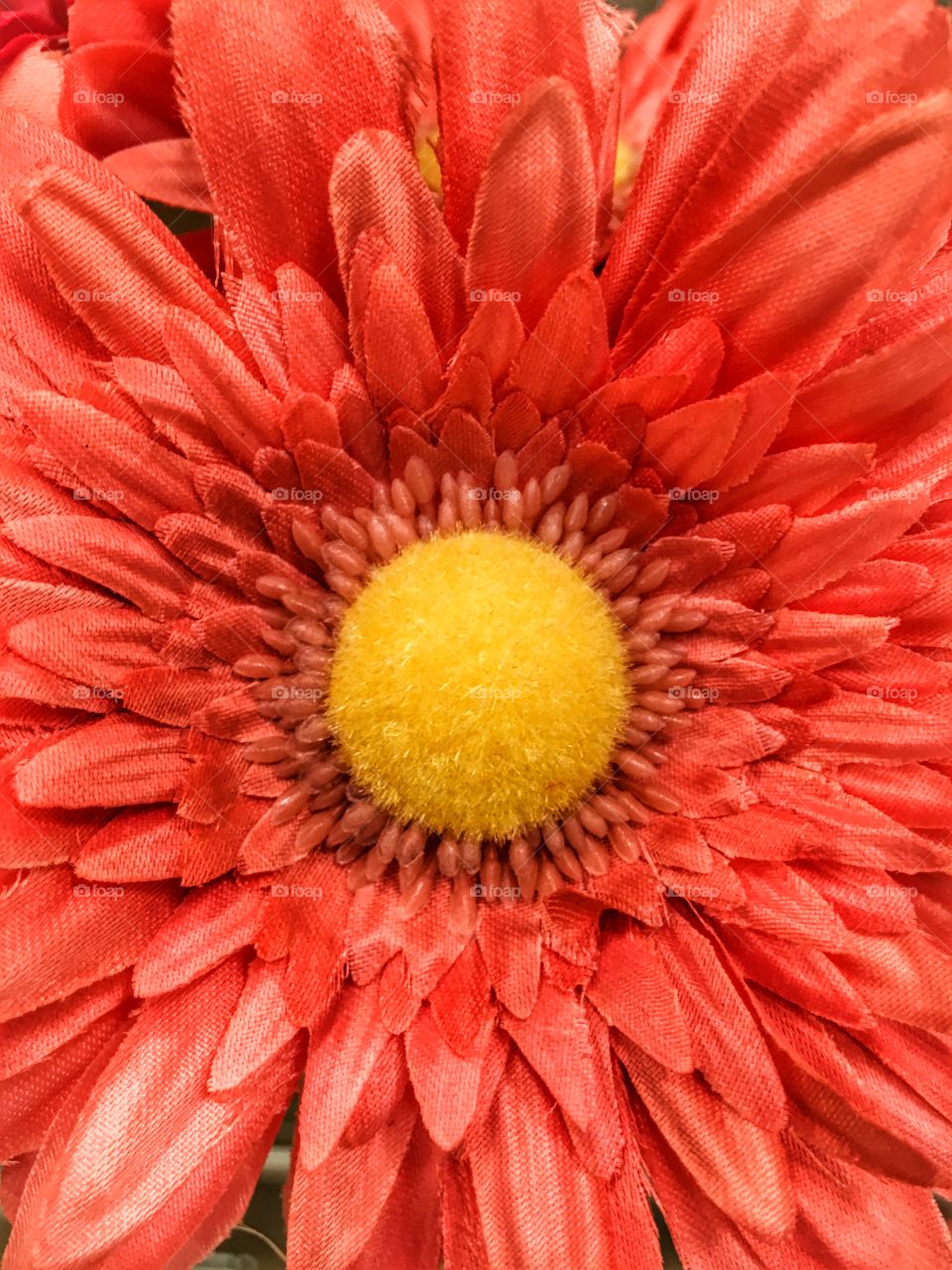 Orange artificial flower

