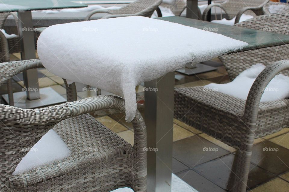 Winter details.  Snow on the table and chairs