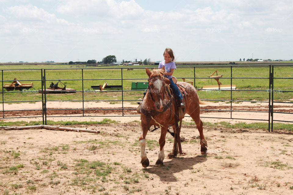 Child on horseback