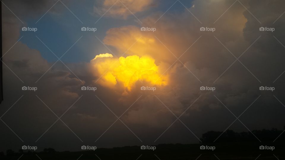 sunset and a storm cloud