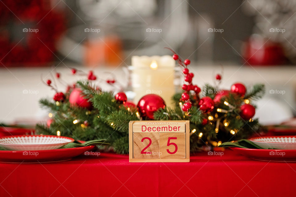 Christmas background with wooden block calendar with the date of December 25