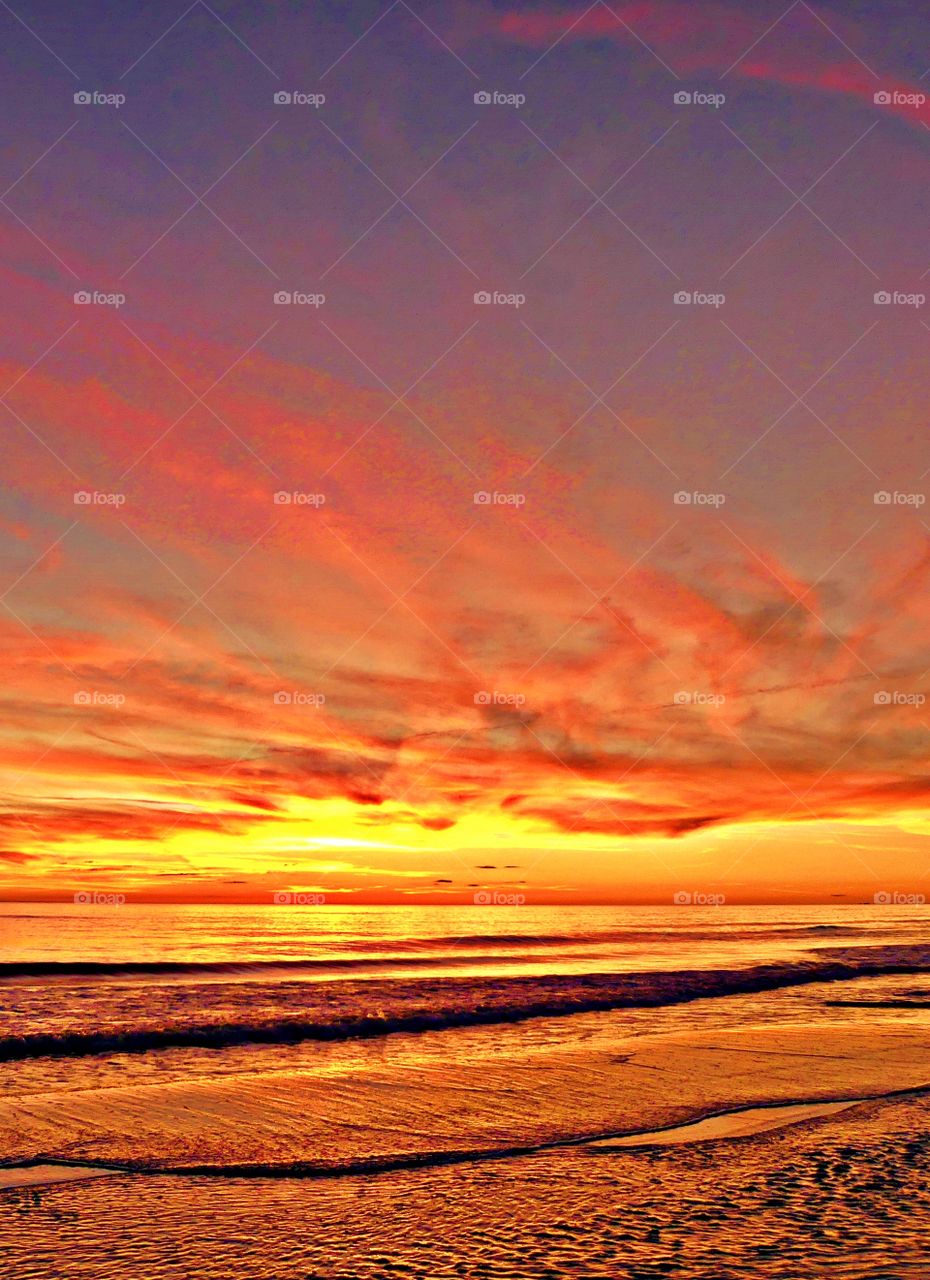 SUNSETS - A sunset is a perfect conclusion. It's the silky, smooth collusion of skyburst reds, oranges and yellows into the calm of night