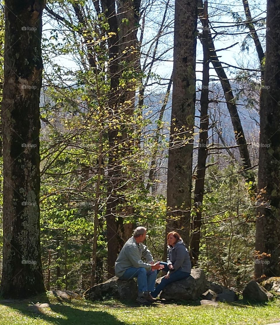 Couple talking outside
