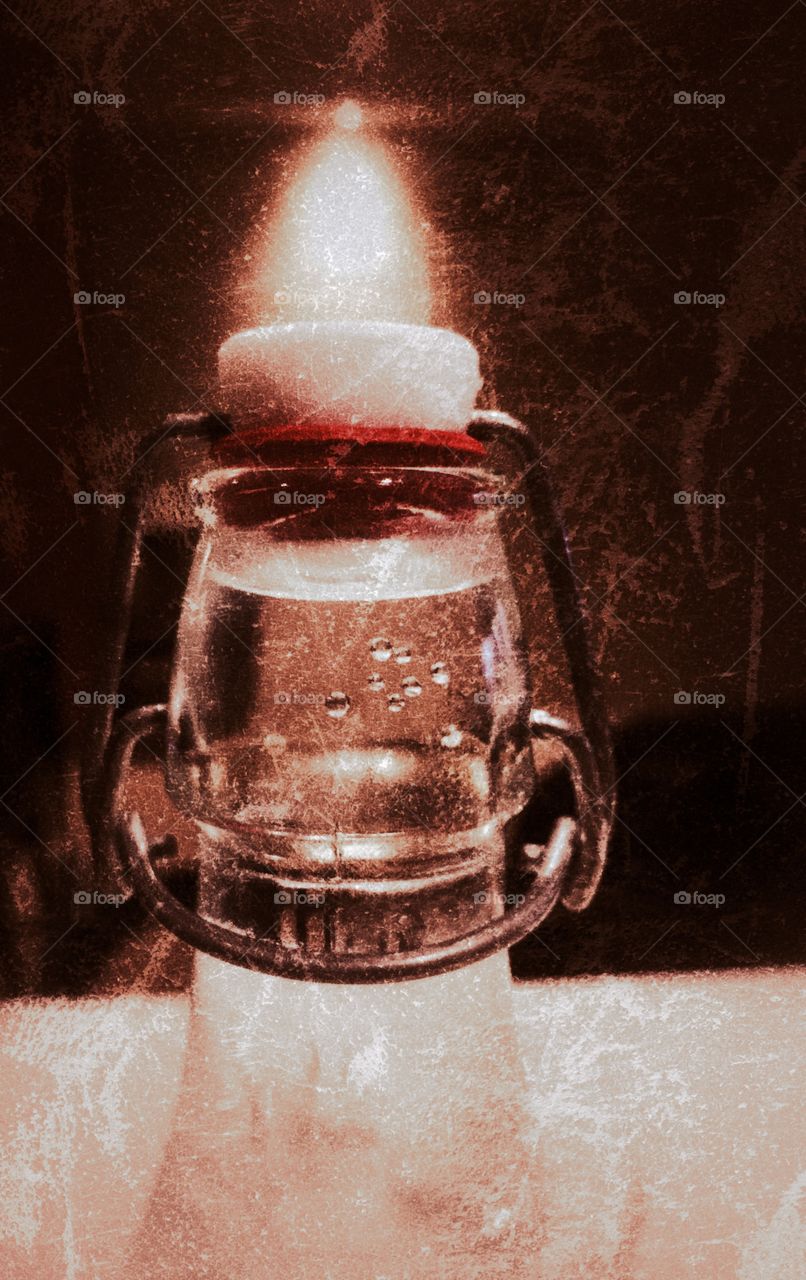 Grungy image of a glass water bottle 
