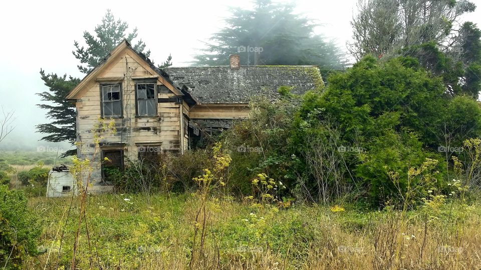 Haunted House in Irish Beach on a cloudy day