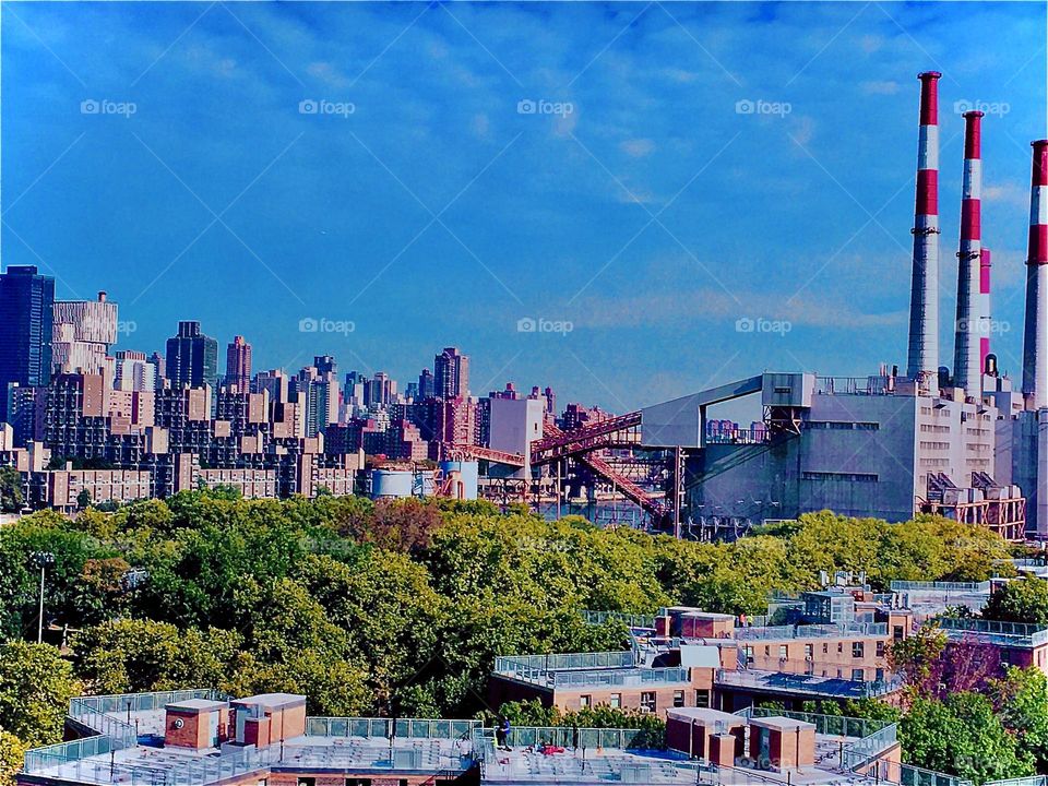 A cityscape as seen from the highway driving in a car from LIC, Queens, NY to Forest Green, Brooklyn. The waters of the East River can also be seen. 2020. Hypnotic Productions