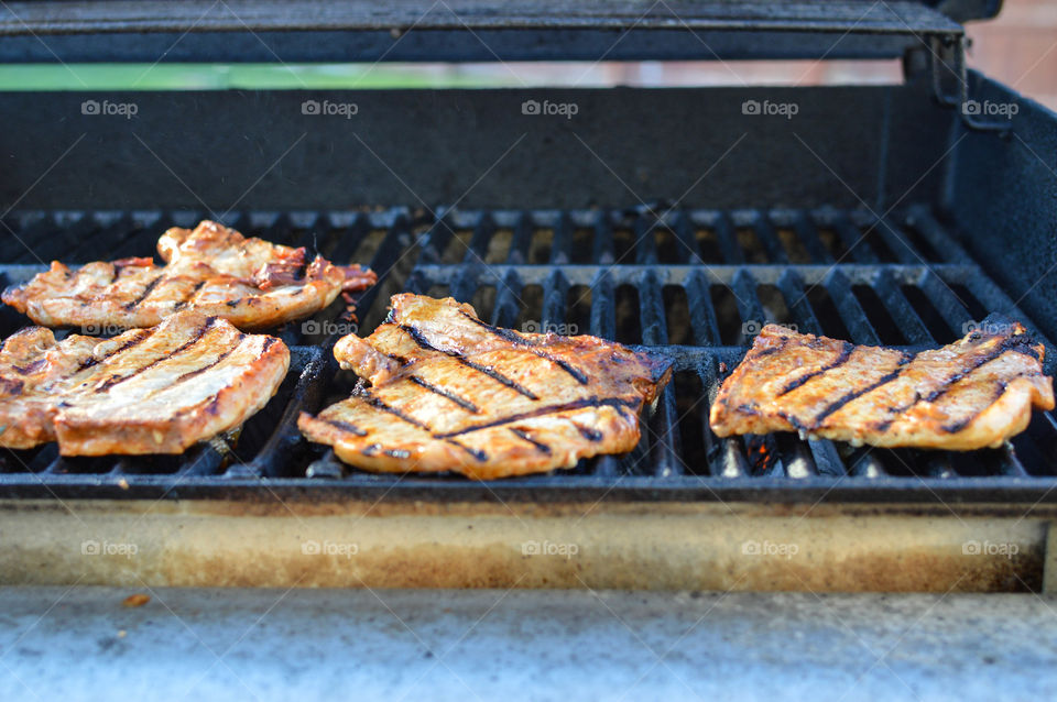 Pork chops on the grill