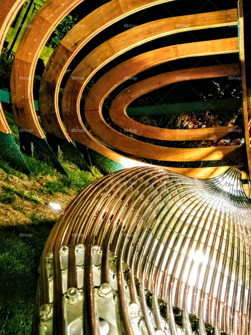 sculpture in city park at night