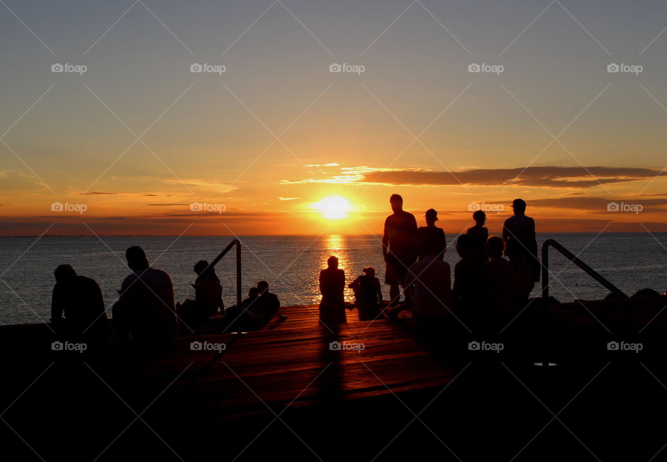 People enjoying the sunset in Malmö, Sweden.