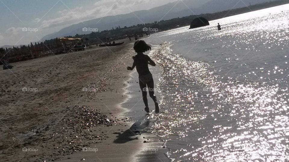 Child on the beach.
Sardinia, Italy