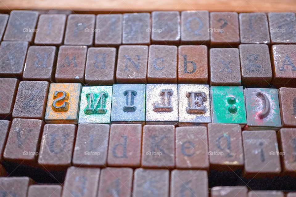 Wooden rubber stamps, for inverted SMILE : ) ; creative thinking concept, thinking outside the box; DIY handicraft letter stamps