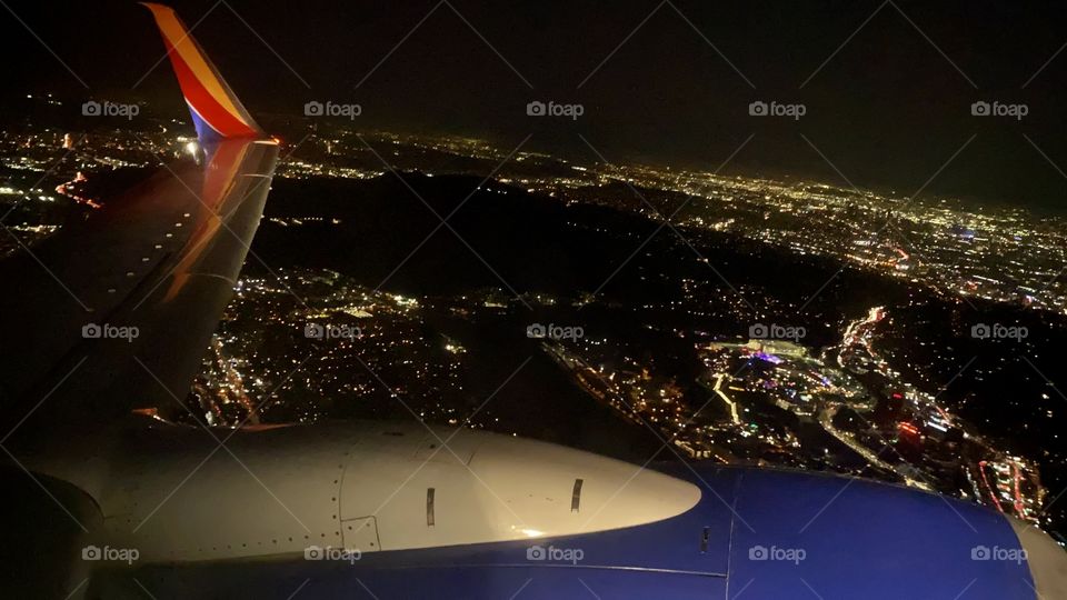 Southwest Airlines Boeing 737 flying over Los Angeles California at night after taking off from Hollywood Burbank Airport (BUR)