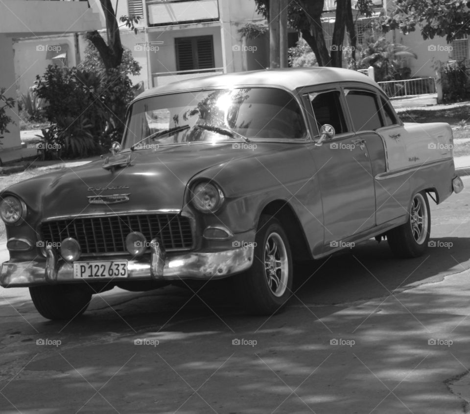 Cuba: Classic Chevy! As I see Santiago de Cuba in black and white, and sometimes in color! Cuba is a special destination and people know how to enjoy themselves, despite obvious signs of poverty and hardships. The streets are filled with vibrant colors and rhythm and it is not uncommon to see people dancing in the streets and alleys to the sound of loud salsa music! Wish I could, but It's impossible to capture it all!