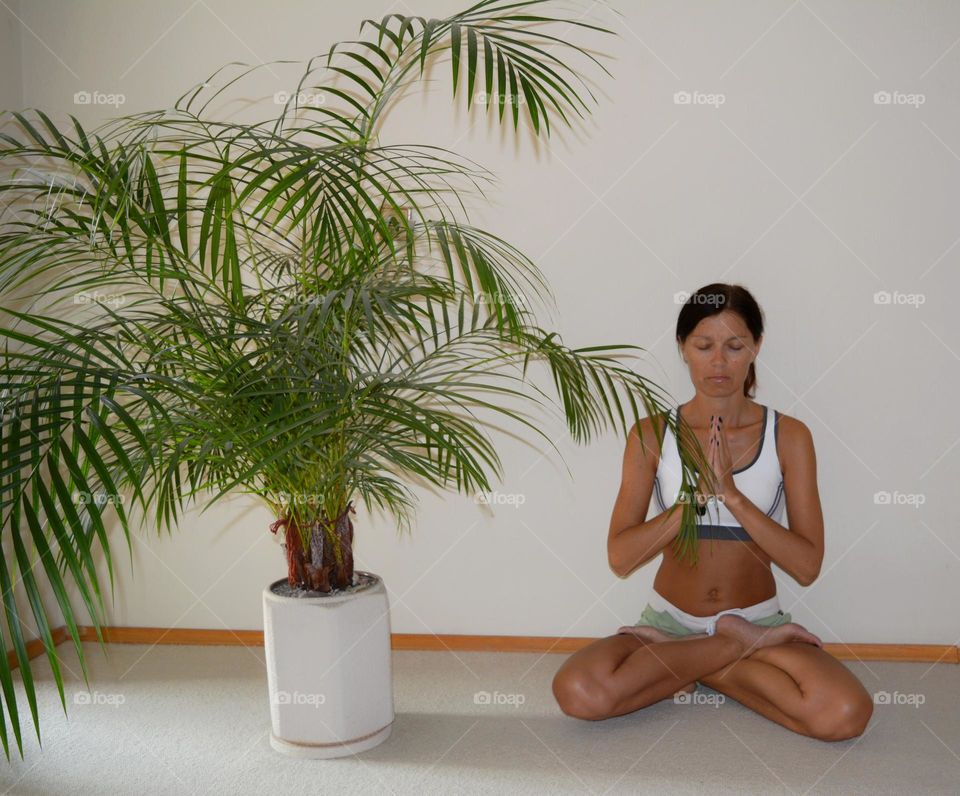 woman training yoga indoor