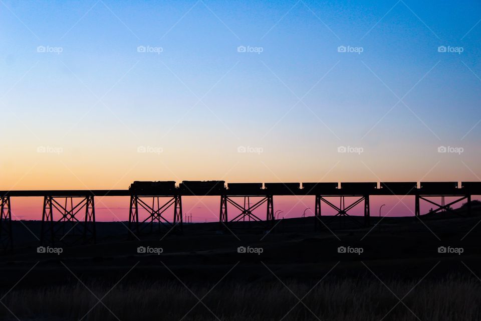 Train bridge silhouette sunset 